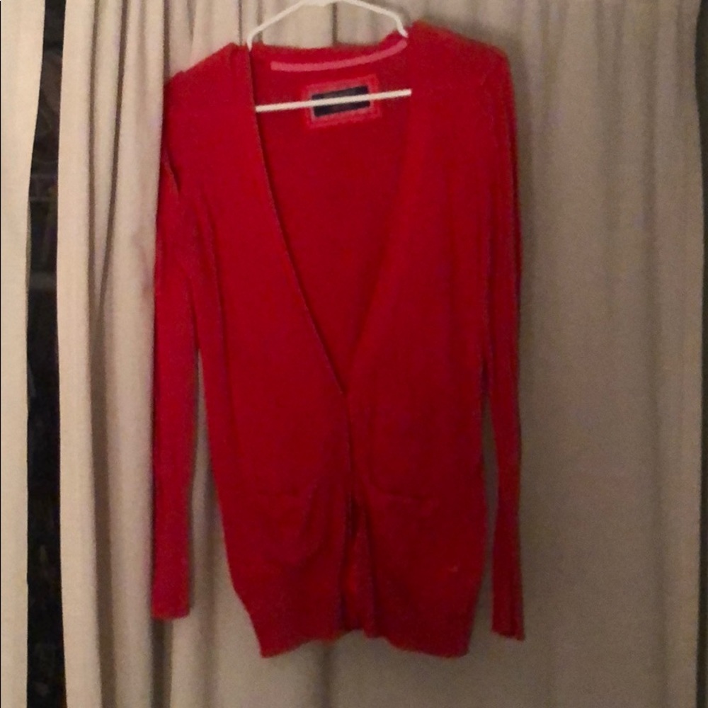 Red cardigan.